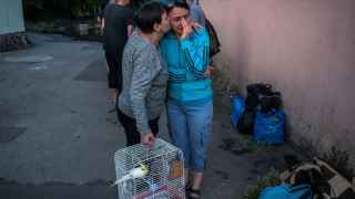 Местные жители в Херсоне после эвакуации из зоны затопления